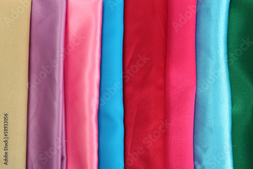 Photo: heap of cloth fabrics, close up heap of cloth fabrics, close up