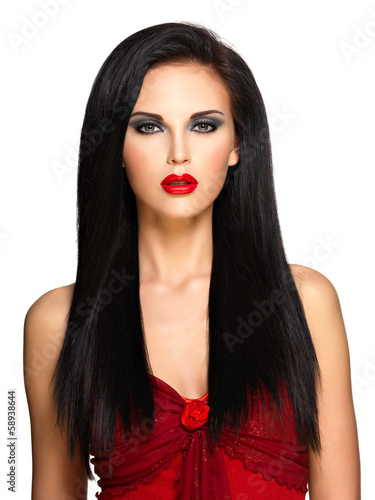 Photo: Portrait of the beautiful woman with black hairs and red lips Portrait of the beautiful woman with black hairs and red lips
