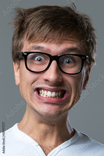 Photo: Funny guy with silly grimace Funny guy with silly grimace