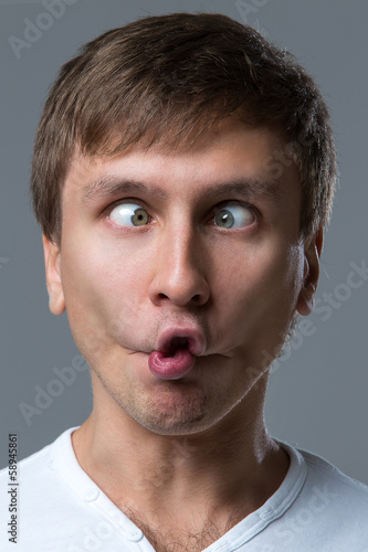 Photo: Funny guy with silly grimace Funny guy with silly grimace