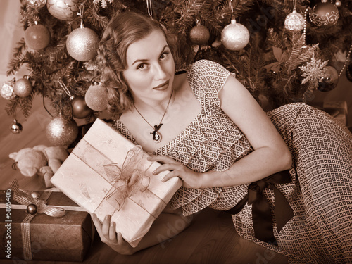 Photo: Woman receiving gifts. Black and white retro. Woman receiving gifts. Black and white retro.