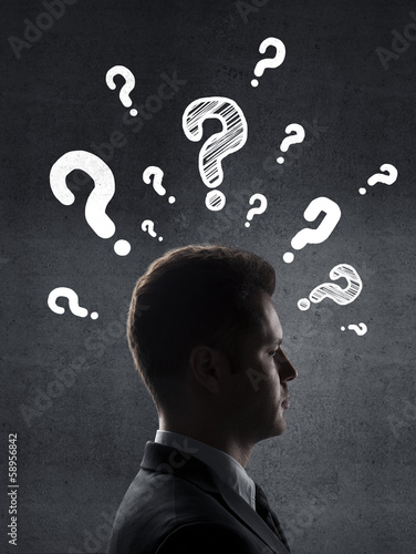 Photo: man with question mark man with question mark