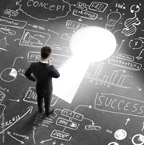 Photo: man looking at business concept man looking at business concept