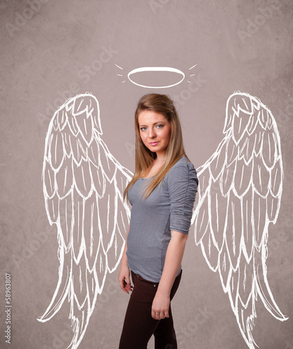 Photo: Cute girl with angel illustrated wings Cute girl with angel illustrated wings