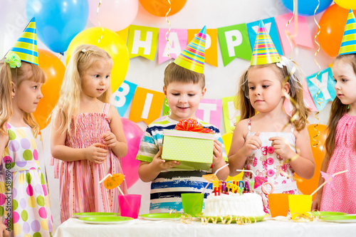 Photo: group of kids at birthday party group of kids at birthday party