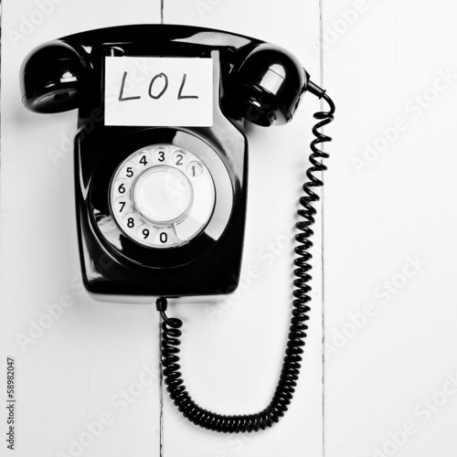 Photo: Retro versus modern telephone concept Retro versus modern telephone concept