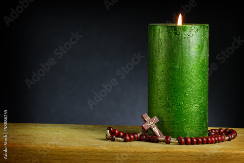 Photo: candle with wooden cross candle with wooden cross