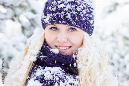 Photo: beautiful winter woman playing with snow beautiful winter woman playing with snow