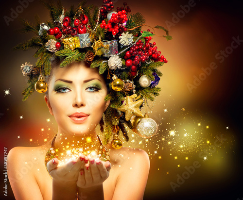 Photo: Christmas Winter Woman with Miracle in Her Hand Christmas Winter Woman with Miracle in Her Hand