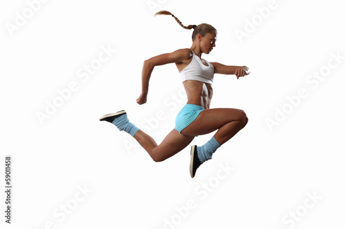 Photo: Image of sport woman jumping Image of sport woman jumping