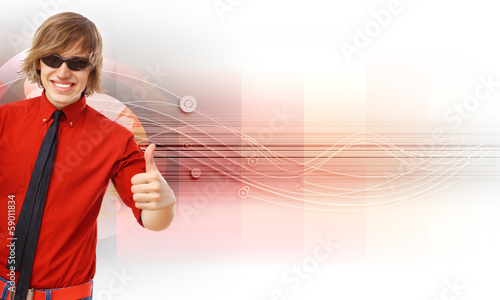 Photo: Happy smiling young man dancing Happy smiling young man dancing