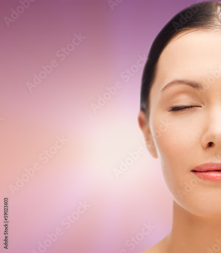 Photo: relaxed young woman with closed eyes relaxed young woman with closed eyes