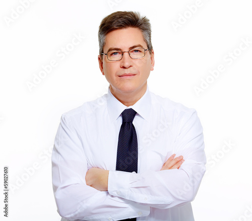 Photo: Businessman isolated on white. Businessman isolated on white.