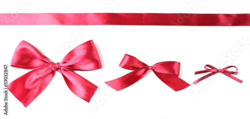 Photo: Color gift satin ribbon bows, isolated on white Color gift satin ribbon bows, isolated on white