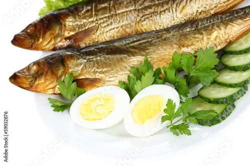 Photo: Smoked fish on plate close up Smoked fish on plate close up