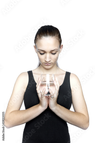 Photo: Young woman with glass of water Young woman with glass of water