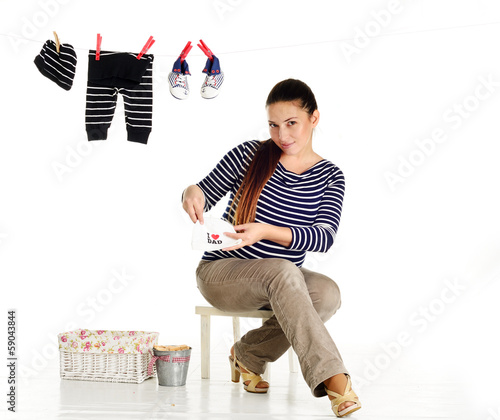 Photo: pregnant woman with clothing pregnant woman with clothing
