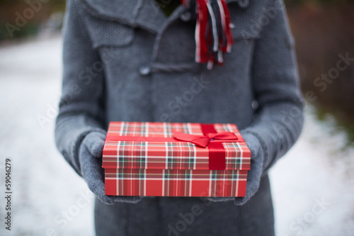 Photo: Holding giftbox Holding giftbox