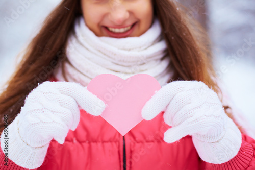 Photo: Girl with pink heart Girl with pink heart