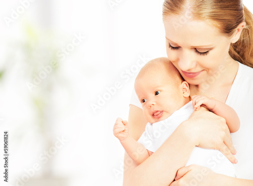 Photo: newborn baby in the arms of mother newborn baby in the arms of mother