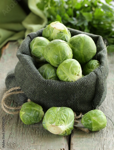 Photo: fresh raw organic green brussel sprouts fresh raw organic green brussel sprouts