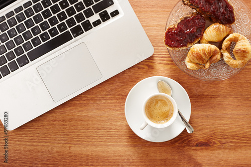 Photo: Having breakfast in front of computer Having breakfast in front of computer