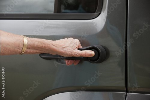 Photo: Opening car using the door handle Opening car using the door handle