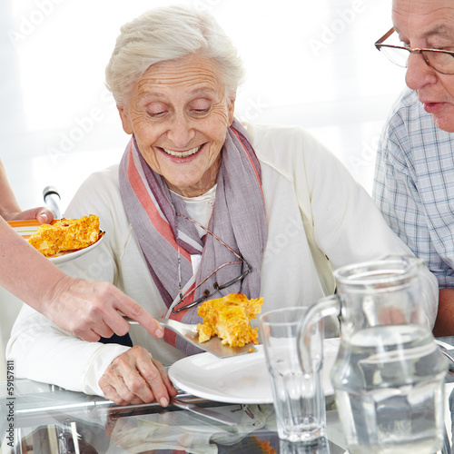 Photo: Senior citizen couple eating lunch Senior citizen couple eating lunch