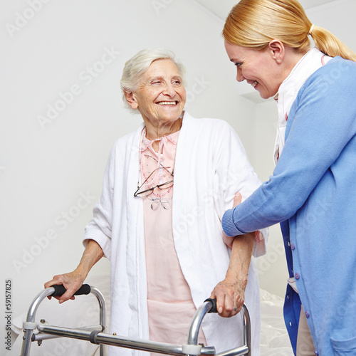 Photo: Geriatric nurse helping senior citizen woman Geriatric nurse helping senior citizen woman