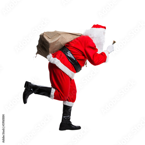 Photo: rennender Weihnachtsmann rennender Weihnachtsmann