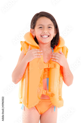 Photo: Girl in a swimsuit, beachwear, studio shot, life vest Girl in a swimsuit, beachwear, studio shot, life vest