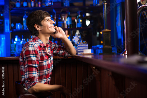 Photo: man with a cup of coffee man with a cup of coffee