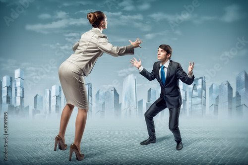 Photo: two businessmen fighting as sumoist two businessmen fighting as sumoist