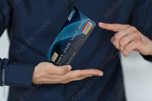 Photo: hand creditcard hand creditcard