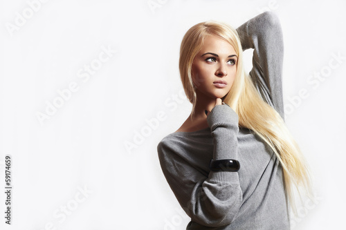 Photo: Beautiful blond woman in dress.accessories.fashion.isolate Beautiful blond woman in dress.accessories.fashion.isolate