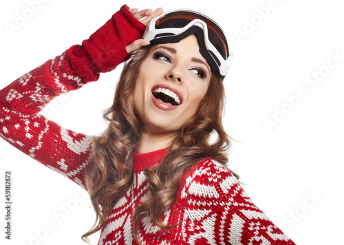 Photo: Portrait of a happy young girl snowboarding Portrait of a happy young girl snowboarding