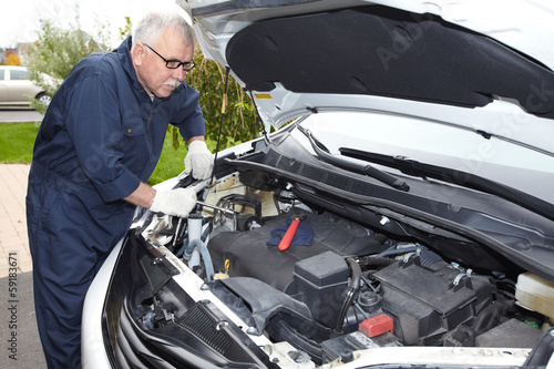 Photo: Car mechanic. Car mechanic.