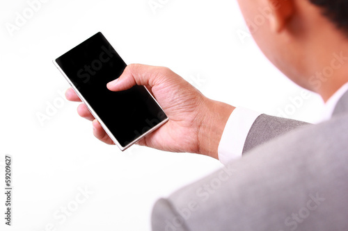 Photo: Using smartphone Using smartphone