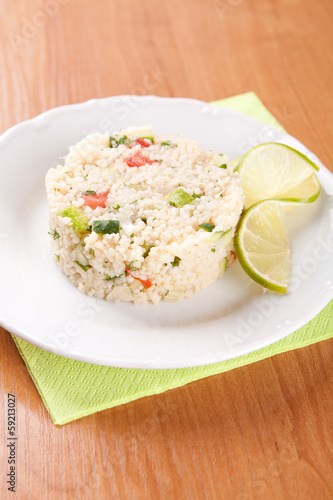 Photo: Salad with couscous, parsley, tomatoes and cucumber Salad with couscous, parsley, tomatoes and cucumber