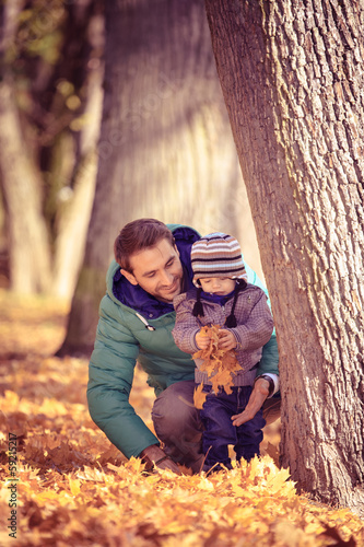 Photo: man in the autumn park man in the autumn park