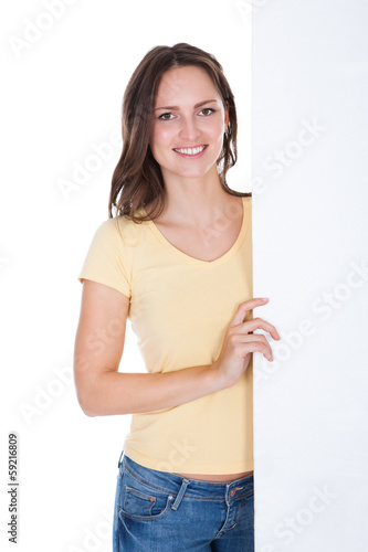 Photo: Happy Woman Holding Placard Happy Woman Holding Placard