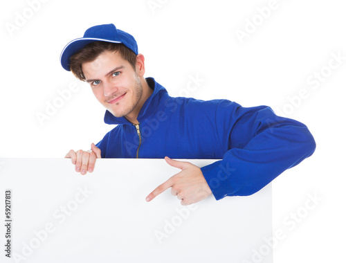 Photo: Male Worker Cleaning Floor Male Worker Cleaning Floor