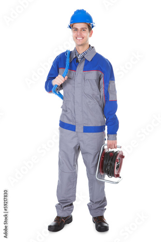 Photo: Electrician Holding Working Instrument Electrician Holding Working Instrument