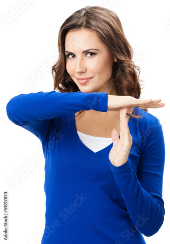 Photo: Woman showing heart symbol gesture, isolated Woman showing heart symbol gesture, isolated