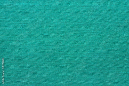 Photo: The granulated texture of a green material The granulated texture of a green material