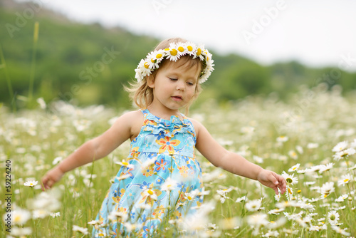 Photo: girl in the daisy field girl in the daisy field