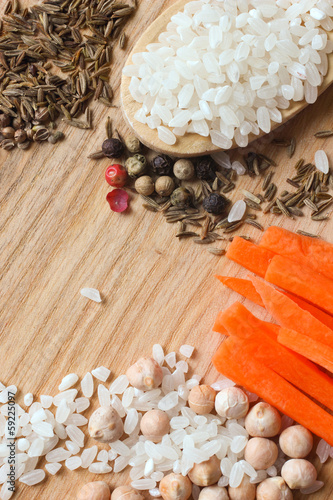 Photo: Ingredients for Uzbek pilaf on wooden background Ingredients for Uzbek pilaf on wooden background