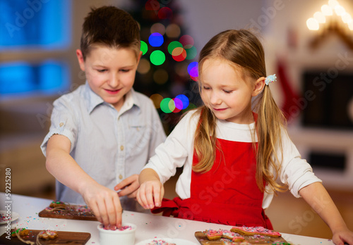 Photo: Kids baking Christmas cookies Kids baking Christmas cookies