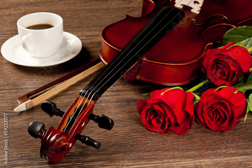 Photo: Red roses and a violin Red roses and a violin
