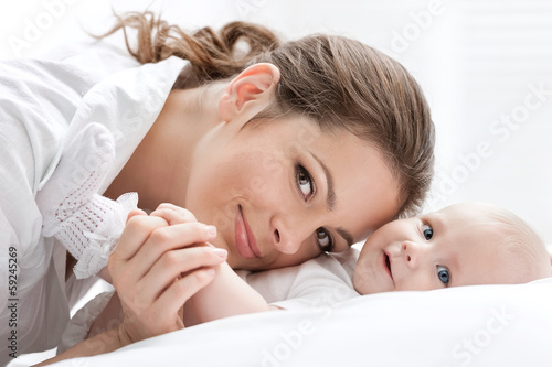 Photo: Portrait of happy mother and baby Portrait of happy mother and baby